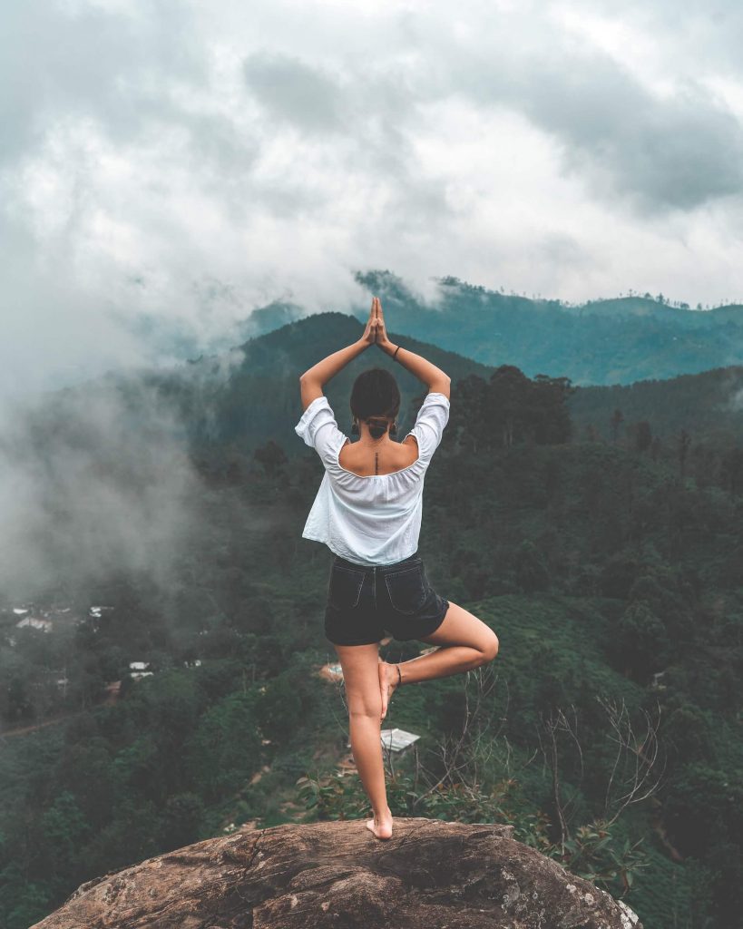 yoga pose on mountain